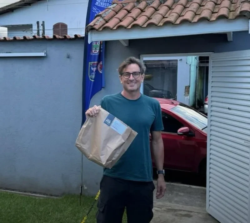 Alison no cartão de resultados da Navegantes.